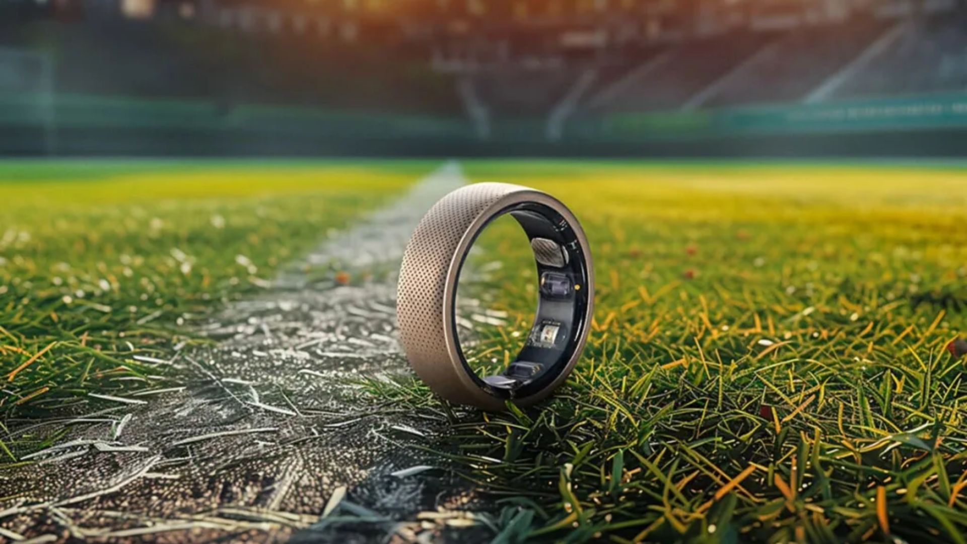 Alternativas ao Samsung Galaxy Ring: Anel da Amazfit em um campo de futebol